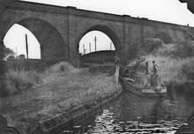 Wolverhampton Lock 12, SVR Viaduct and working boat. 1958. Photographer: C Faulkener.