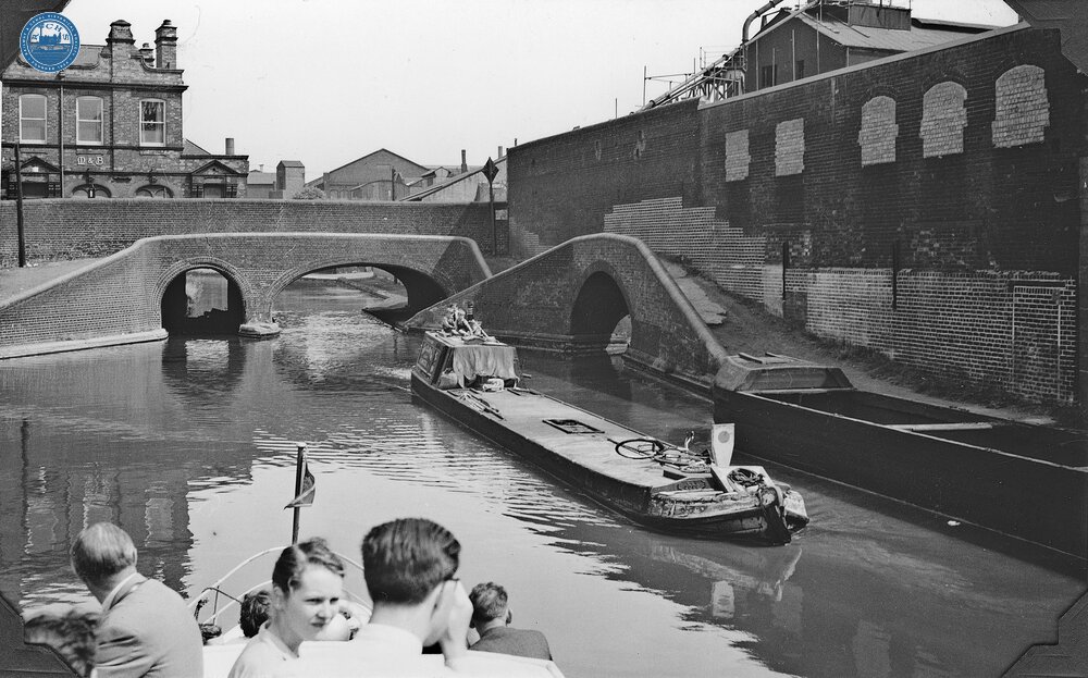 BCN: Tar Boat at Spon Lane Bridge, Chance Glass Works on right. July 1958. Photographer: R Sellick.