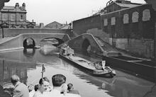 BCN: Tar Boat at Spon Lane Bridge, Chance Glass Works on right. July 1958. Photographer: R Sellick.