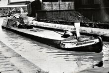 BCN Old Main Line. Thomas Clayton tar boat 'Severn' crossing Stewart Aqueduct, 1954