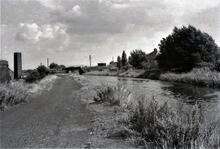 BCN Old Main Line: Looking east from Tipton Green towards South Staffs Railway bridge (CRT name Lindley Avenue Metro Bridge). 1963