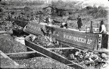 BCN Cannock Extension: Hednesford Basin with WH Bowater's steam tug 'Primus' surrounded by day boats loaded with coal. 1921