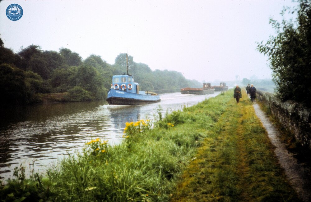 Tug and barges near Purton. 1982
