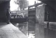 Trip boat descending Hoe Mill Lock. July 1957
