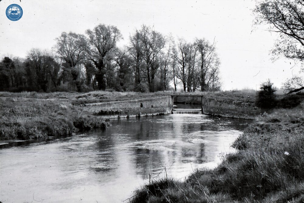 Weir with bridge across