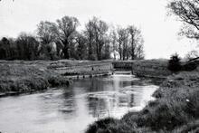 Weir with bridge across