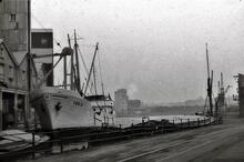 Coaster IDA-D with barges in Ipswich Docks 
