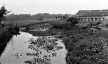 Former lock with sluice structure below and factory alongside (IS7)