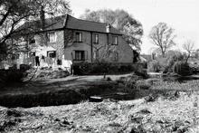 Modern(?) house by river (SX9)