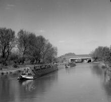  Narrow boats emerging from lock south of Watford. April 1955