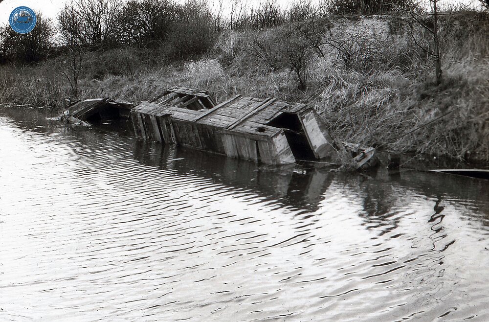 Sunken part converted(?) wooden narrow boat