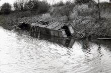 Sunken part converted(?) wooden narrow boat