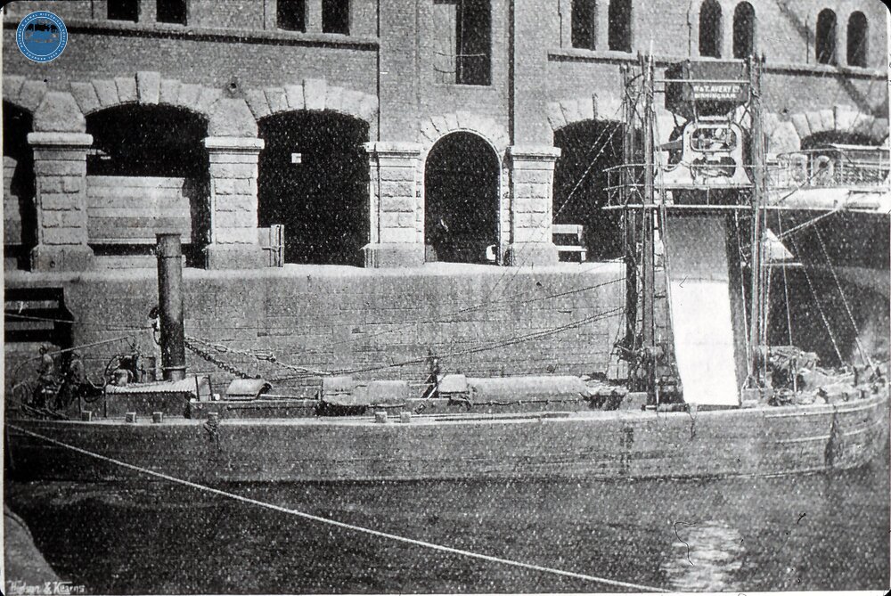Liverpool. Waterloo Docks. Steam flat being loaded at the grain silo. Auto weighing machine by W&T Avery. 1919