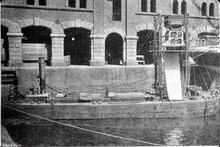 Liverpool. Waterloo Docks. Steam flat being loaded at the grain silo. Auto weighing machine by W&T Avery. 1919