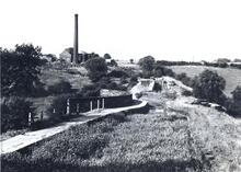 Hollingwood Branch. Medlock Aqueduct and the engine house of Old Law Colliery and locks. 1959