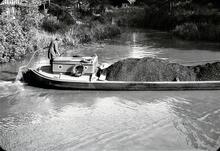 Coal-laden short boat at Worsley Turn