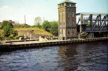 Barton Swing Aqueduct over the Manchester Ship Canal. 'The tank' on the island & the old abutment. 17 May 1980
