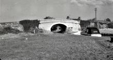 Lancaster Canal: Road bridge at bottom of Tewitfield locks. 3/1964