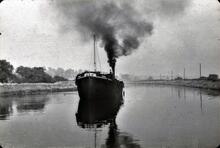 Weaver flat Syria approaching Acton swing bridge. 1955