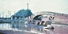 Narrowboat and Hawkesbury Junction bridge. 