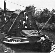 Fore end of Friendship showing arrangement of towing line to Mule with an additional rope tie to fore end stud to assist with steering round bends in the canal
