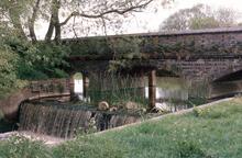 Aynho Weir,  with towpath bridge, May 1990