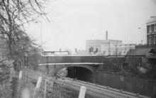 Railway overbridge on route of canal . 1970