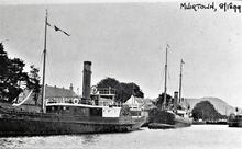 Paddle Steamer and small steam coaster at Muirtown. August 1899