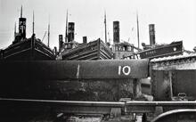 Caledonian Canal, Drifters taken over by Admiralty going E to W taken for conversion to mine sweepers, waiting at rail bridge @ Clachnaharry. Dec 1939