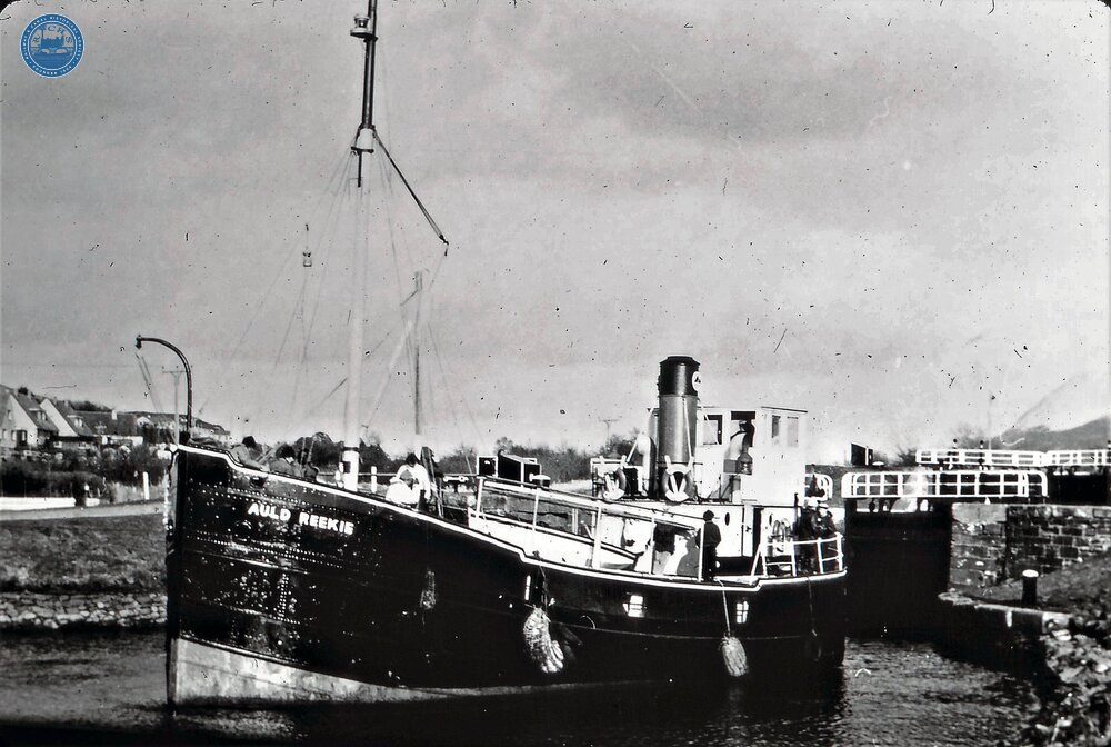 Caledonian Canal, Puffer “Auld Reekie” leaving bottom lock at Corpach
