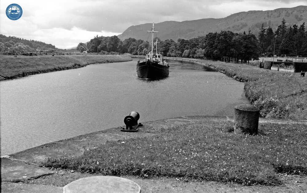 Naval cadet boat approaching lock