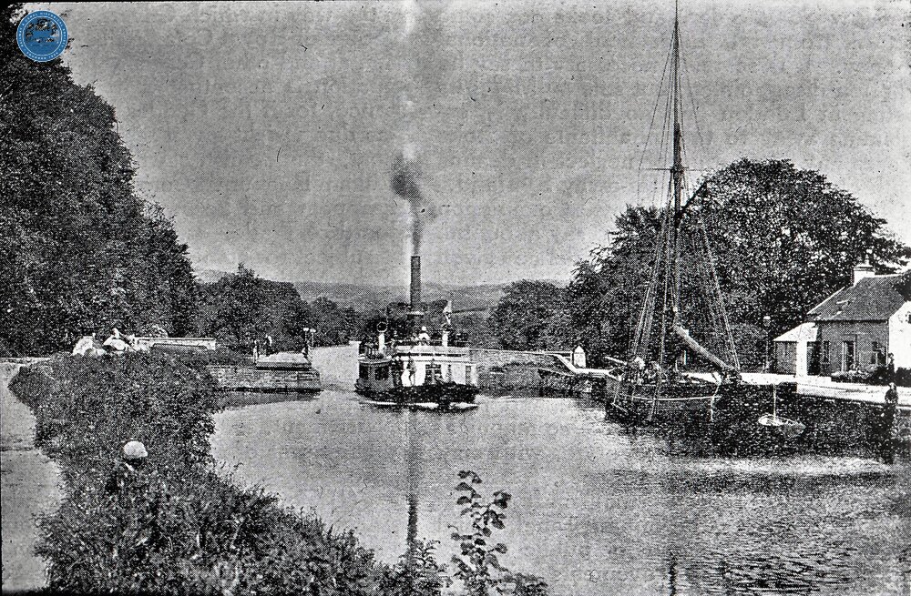 MacBrayne's “Linnet” on the Crinan Canal coming through Oatfield Swing Bridge (No 3) at Lochgilphead, 1921