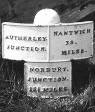 Autherley Junction milepost: 'Nantwich 39 miles'.  5 May 1975