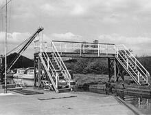 Footbridge and stop gate at Wolverhampton Boat Club.   5 May 1975