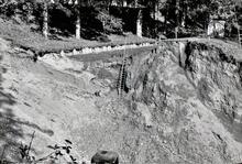 View of Bryn Howel breach and damaged bank. 9/1960 
