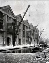 Ellesmere Port Warehouse, cranes and loaded narrowboat