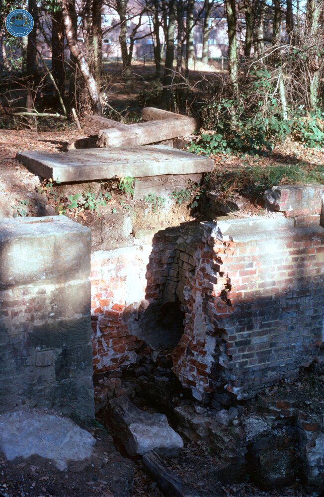 Ground paddle culvert during reconstruction. Circa March 1979