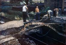 Trent and Mersey Canal. Middlewich. Demolition of Cledford Bridge (No. 166) for road improvements. Late 1960s