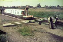 Middlewich Lock 73. Peter Froud's hotel boat "SATURN" had lifted the top gate with it's bow. 1965