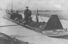 Ashby Canal. A Horse boat trapped by ice during the severe winter of 1929