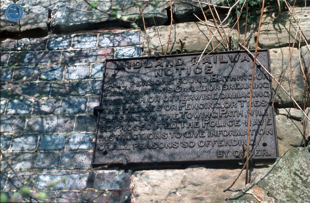 Ashby Canal. Marston. Bridge 1 (Orton Bridge). April 1971. Midland railway notice