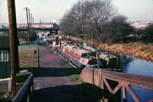Coventry Canal. Salvation Army boats Salvo and Aster moored at Hawkesbury Junction behind two empty pairs, looking towards Coventry.