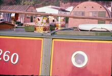 Coventry Canal. Painted water cans on cabin top of Linda at Coventry Basin