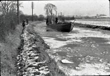 Ice breaking on the  Coventry Canal