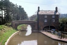 Coventry Canal. Hartshill. House and bridge over canal. 1978