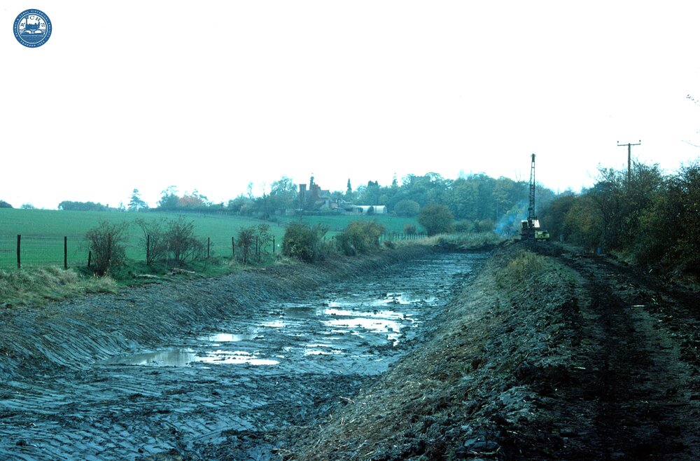 Droitwich Barge Canal, dragline at work, moving towards village