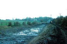 Droitwich Barge Canal, dragline at work, moving towards village