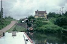 Loaded narrowboat leaving Botterham Locks, Staffs & Worcs Canal, July 1980