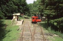 Invererinie waiting shelter; Army Baugley diesel 9112. Fawley Hill Railway 8 June 2003  (Ref 017398E