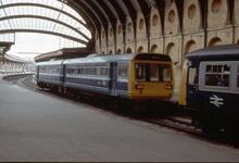 017230 BR DMU Class 142, no 142093. DMSL 55789 leading, DMS no 55743 at rear. York 21 March 1989